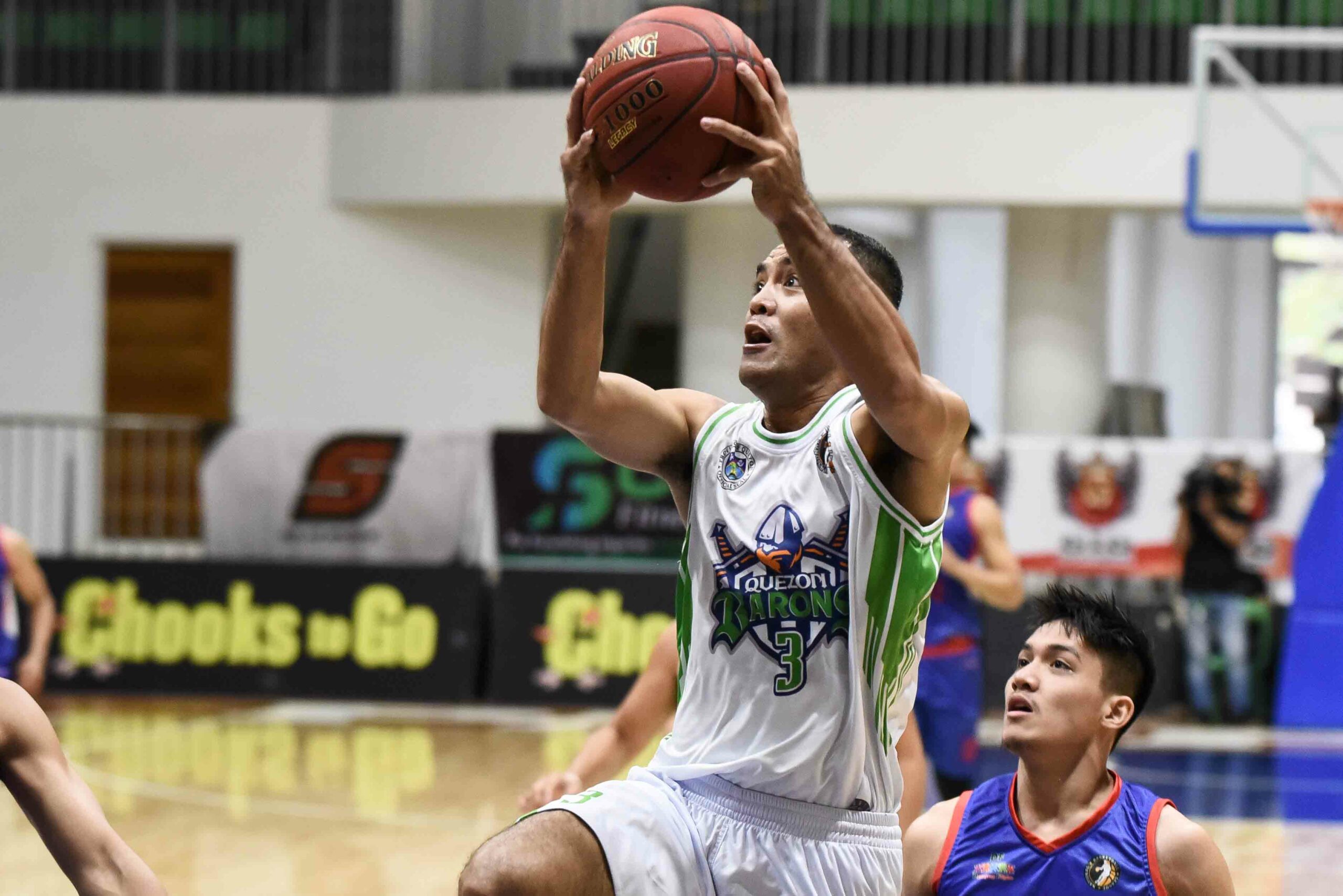 2021-Chooks-NBL-Quezon-vs-Bulacan-Jervin-Deduyo-Quezon-scaled Joseph Celso catches fire as Bulacan DF hands Quezon first NBL loss Basketball NBL News  - philippine sports news