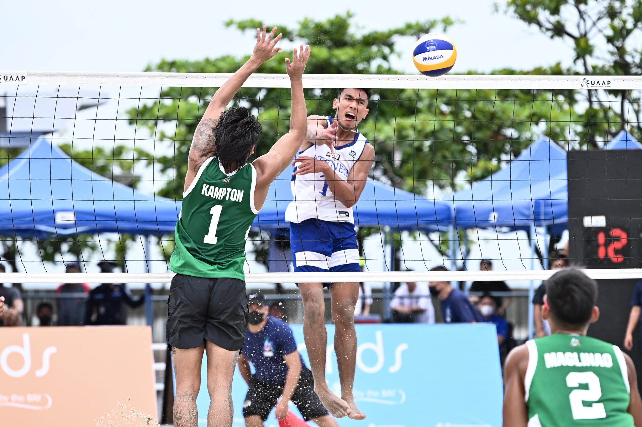 2nd-Photo-Abai-Llenos-ADMU UAAP 84: UST's Dimaculangan-Varga deals Ateneo's Llenos-Pacinio first loss ADMU AdU Beach Volleyball DLSU FEU News NU UAAP UP UST  - philippine sports news