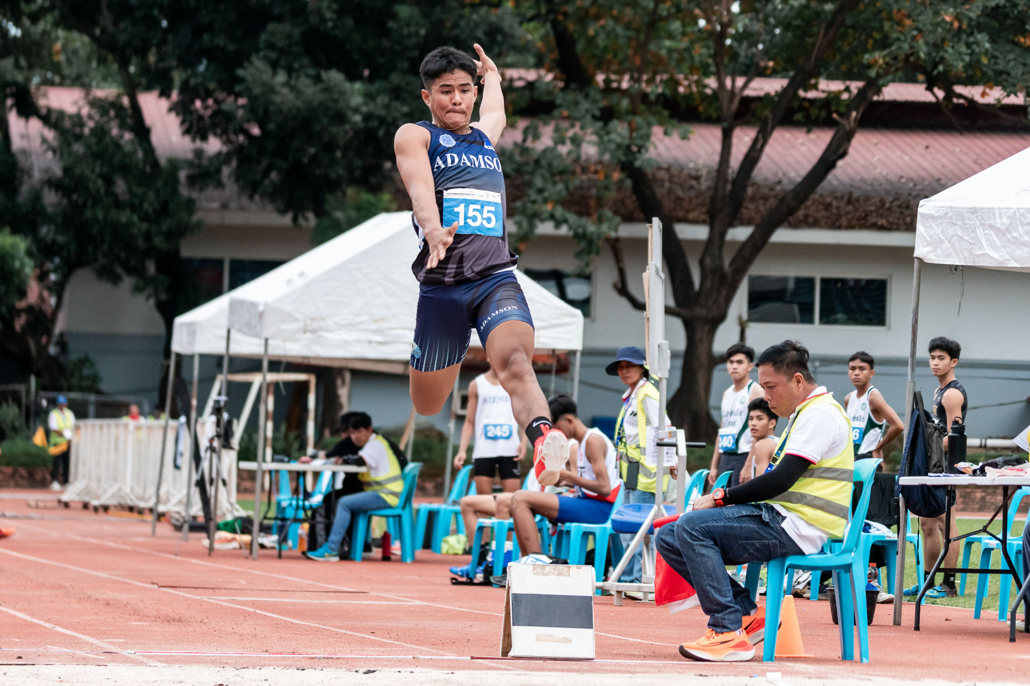 UAAP-86-Athletics-Championship-Day-2-Kurt-Ragudos-00125 UAAP 86 Athletics: Adamson boys flex might in 200m, long jump ADMU AdU DLSU FEU News NU Track & Field UAAP UE UST  - philippine sports news