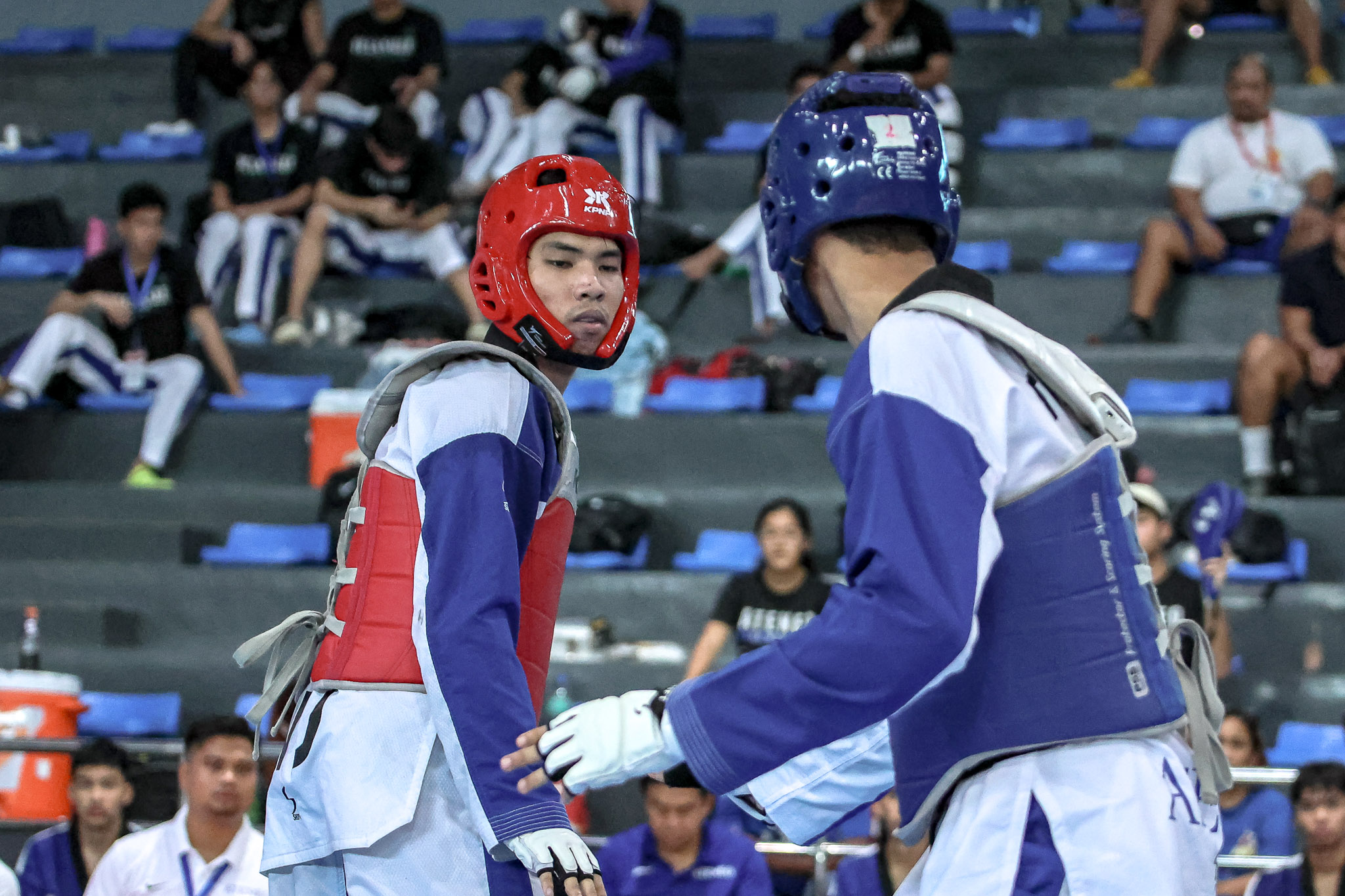 UAAP-86-Kyorugi-Carl-Ayaton-NU Barbosa-less NU conquers UST, secures UAAP Men's TKD five-peat ADMU DLSU FEU News NU Taekwondo UAAP UP UST  - philippine sports news