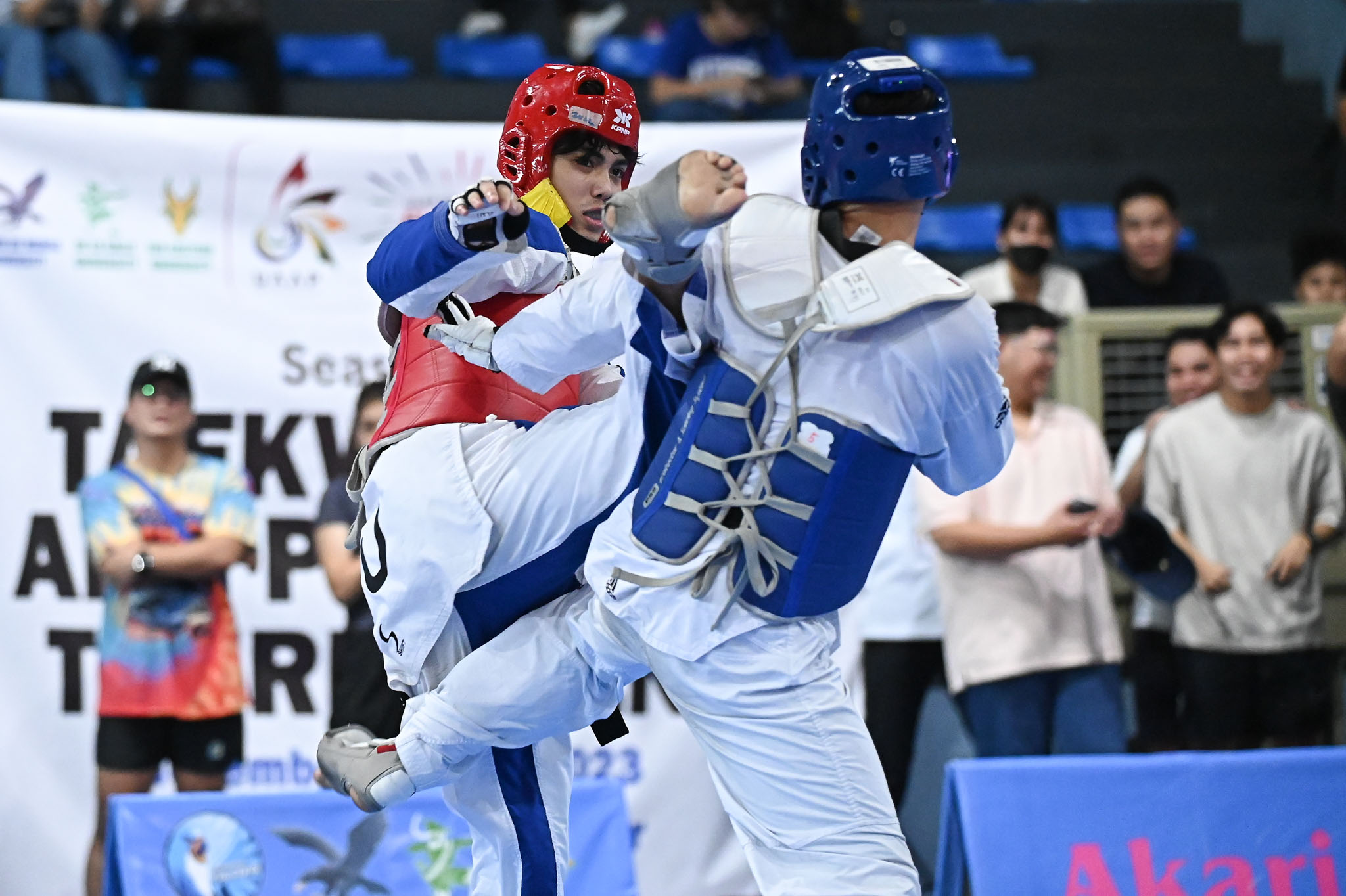 UAAP-86-Kyorugi-Nusair-Lao-3 Barbosa-less NU conquers UST, secures UAAP Men's TKD five-peat ADMU DLSU FEU News NU Taekwondo UAAP UP UST  - philippine sports news