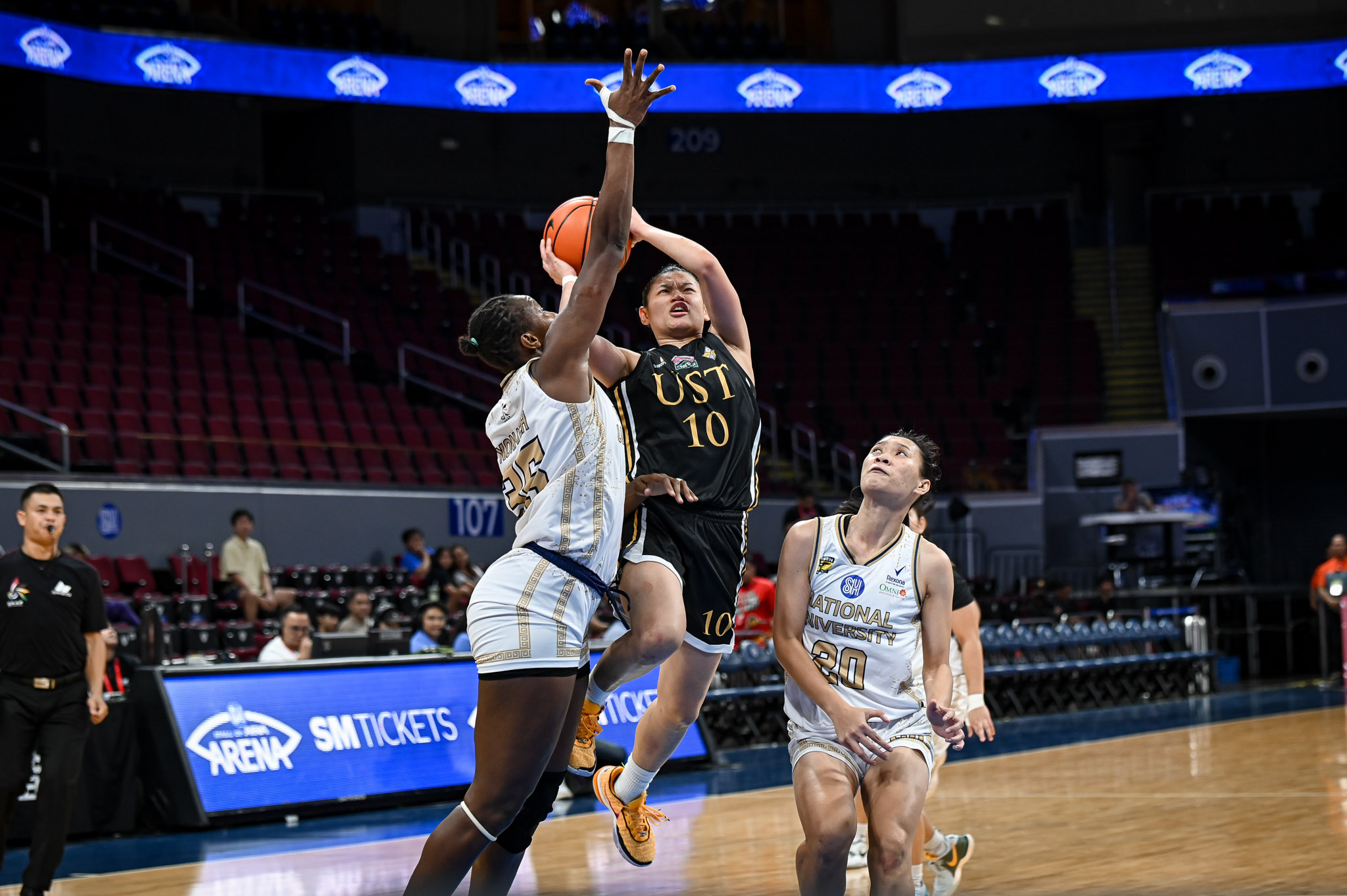 UAAP86-WBB-NU-vs-UST-REYNALYN-FERRER-6626 UST moves to verge of toppling NU's UAAP women's basketball dynasty Basketball News UAAP UST  - philippine sports news