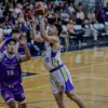 Ian Sangalang battles for a basket in Magnolia's game versus Converge