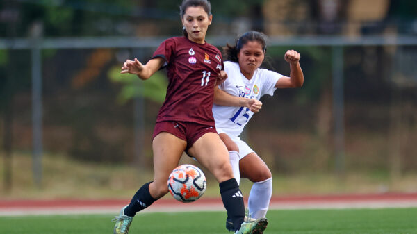 Jennifer Baroin (UP) and Angely Alferez (Ateneo) fight for the ball in the UAAP S86 Women's Football game