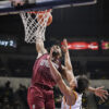 Francis Lopez brings the ball to the rim in UP's win over UST