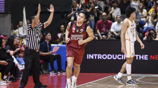 JD Cagulangan on the court for the UP Fighting Maroons in the UAAP Men's Basketball