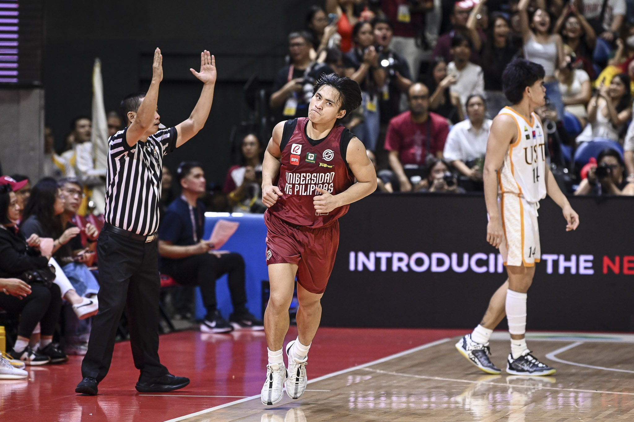 JD Cagulangan on the court for the UP Fighting Maroons in the UAAP Men's Basketball