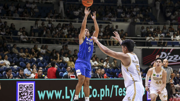 Ateneo's Jared Bahay attempts a shot over NU's Palacielo