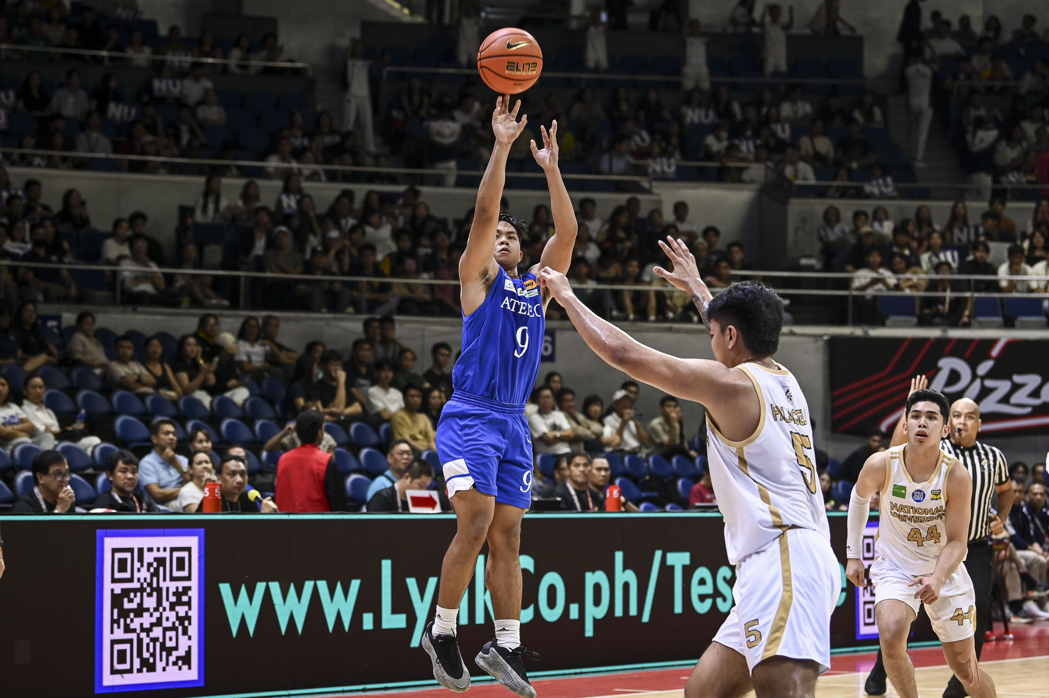 Ateneo's Jared Bahay attempts a shot over NU's Palacielo