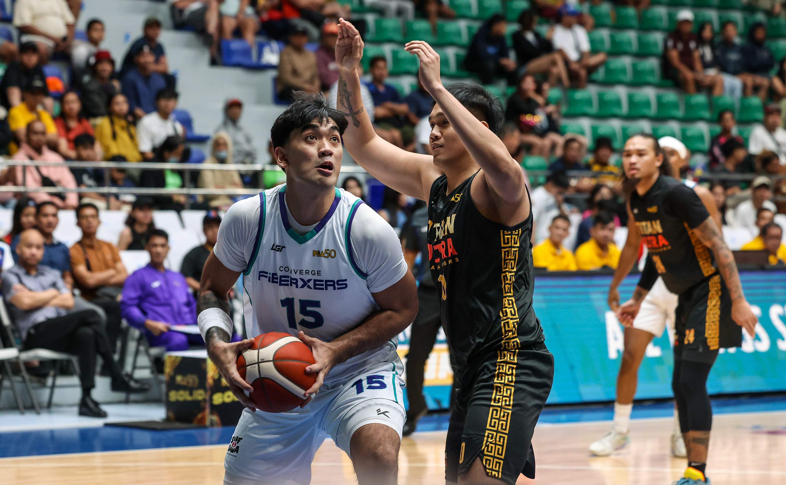 2025-26-PBA-Philippine-Cup-Titan-Ultra-vs-Converge-Justin-Arana Converge crushes Titan Ultra in PBA opener as Juan Gomez de Liano posts historic triple-double Basketball News PBA - philippine sports news