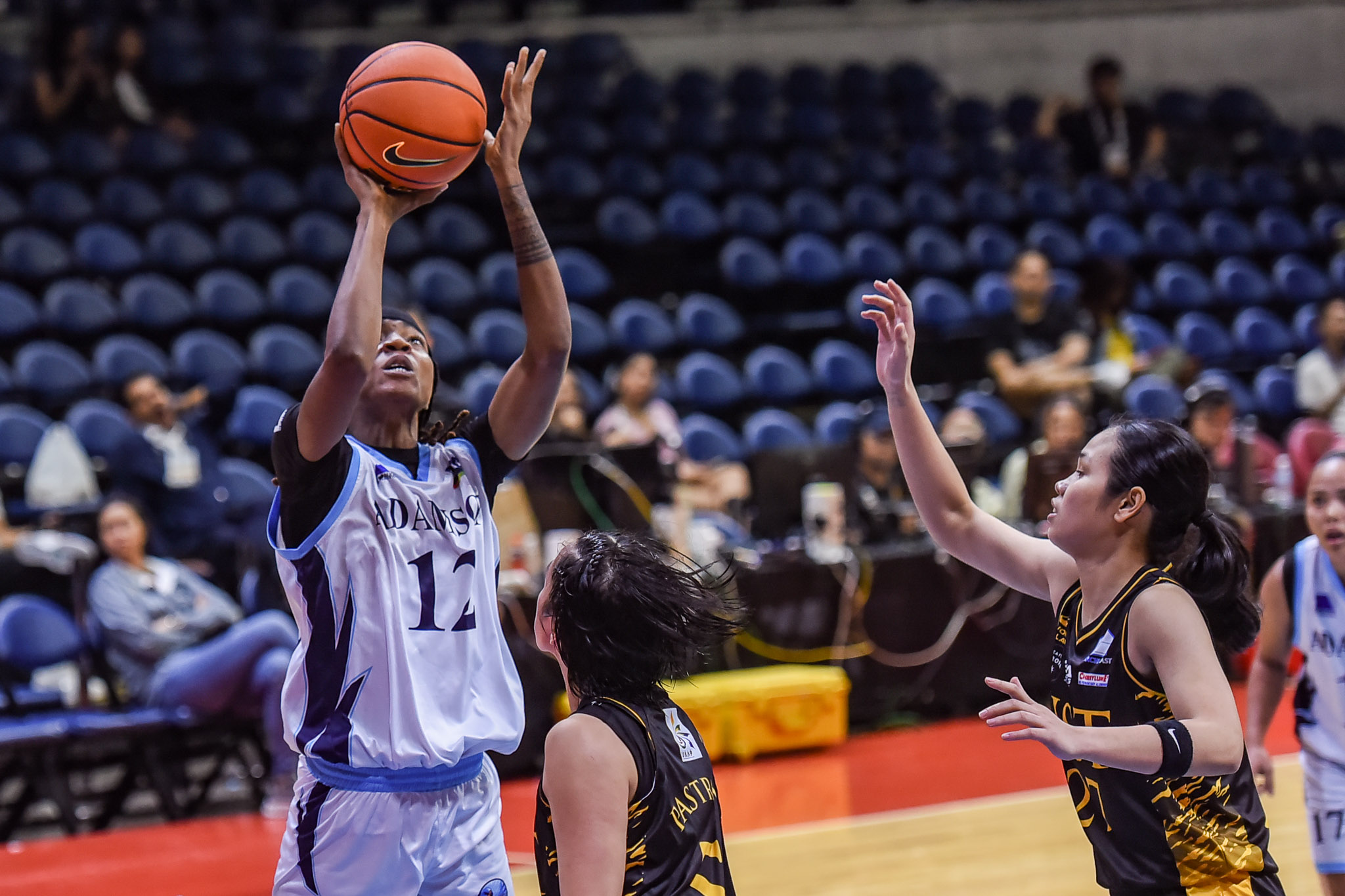 UAAP-88-WBB-UST-vs.-ADU-Kemi-Adeshina-5537 UST one win away from perfect UAAP Women's Basketball first round after rout of Adamson AdU Basketball News UAAP UST - philippine sports news