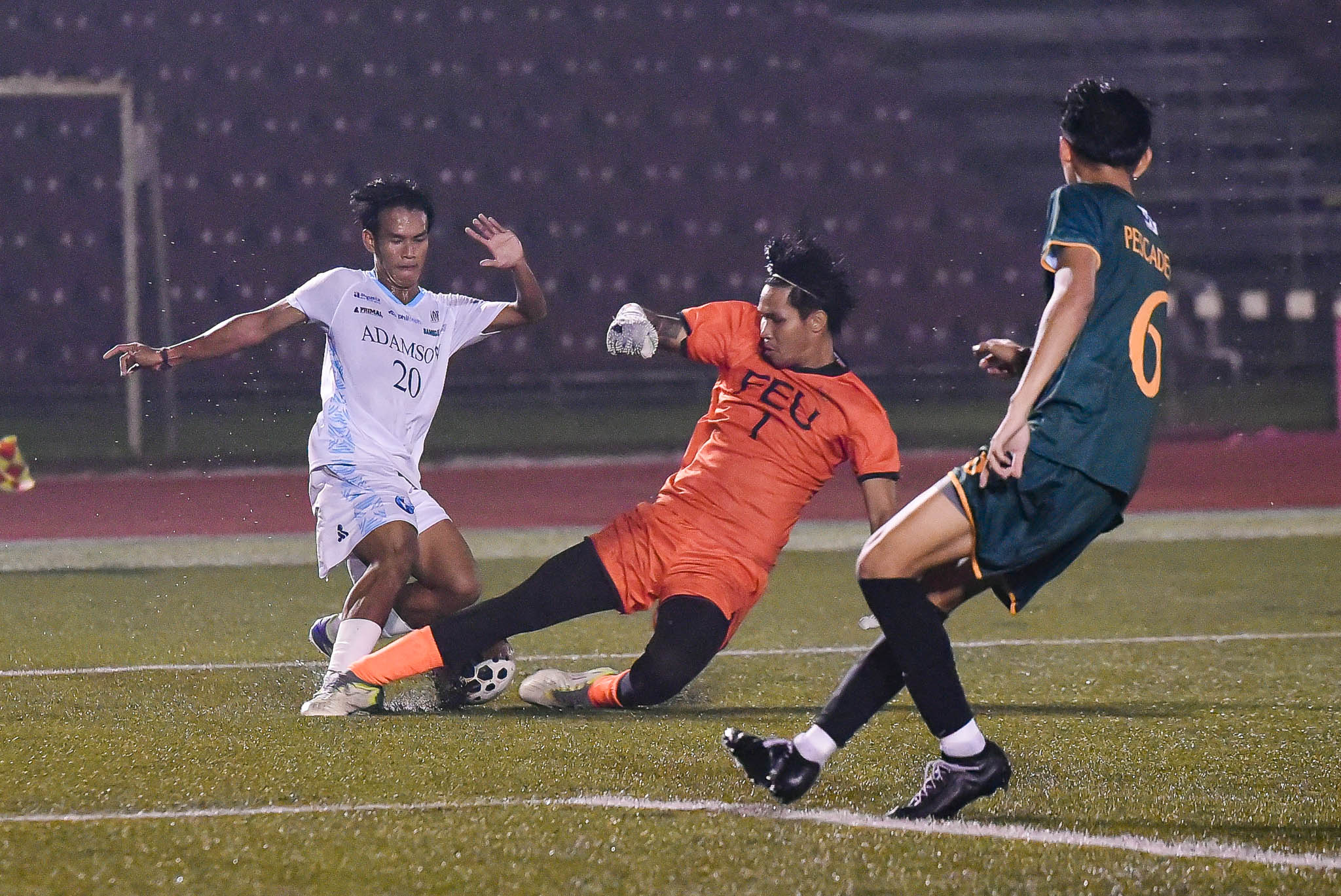 UAAP88-MEN_S-FOOTBALL-ADU-VS-FEU-FABRIGAS-Jetrick-Piolo-7284 Fabrigas heroics lift 10-man FEU past Adamson in UAAP Men's Football AdU FEU Football News UAAP - philippine sports news