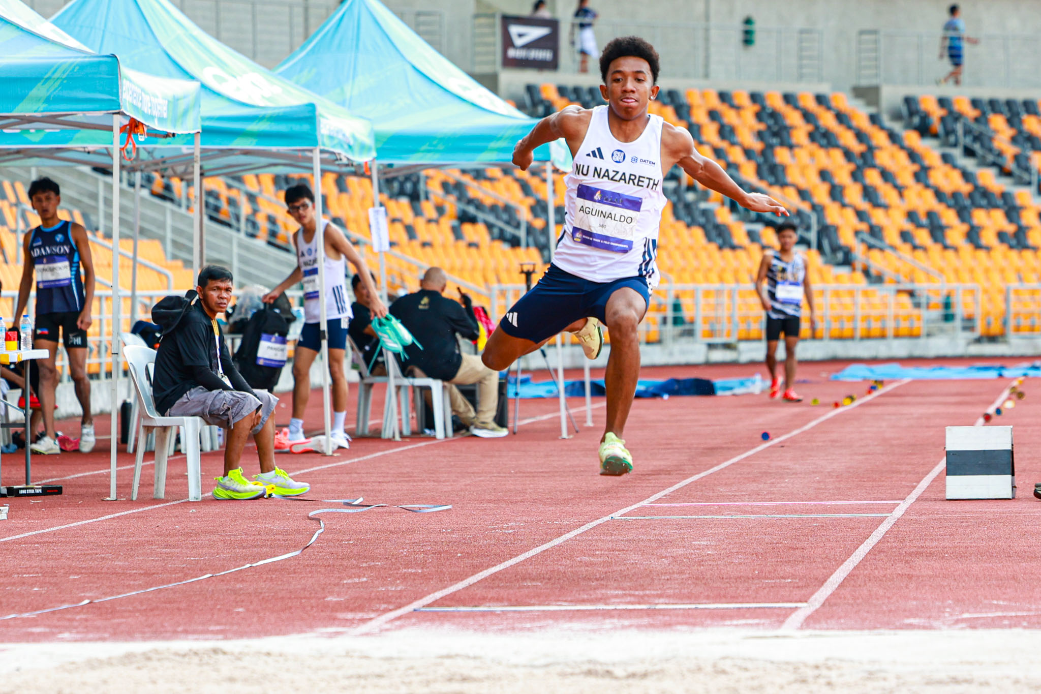 UAAP-88-Athletics-Boys-Triple-Jump-Aguinaldo-Efosa-3277 Ceballos, Rosario lead UST’s record-breaking start at UAAP High School Athletics ADMU AdU DLSU News NU Track & Field UAAP UE UP UST - philippine sports news