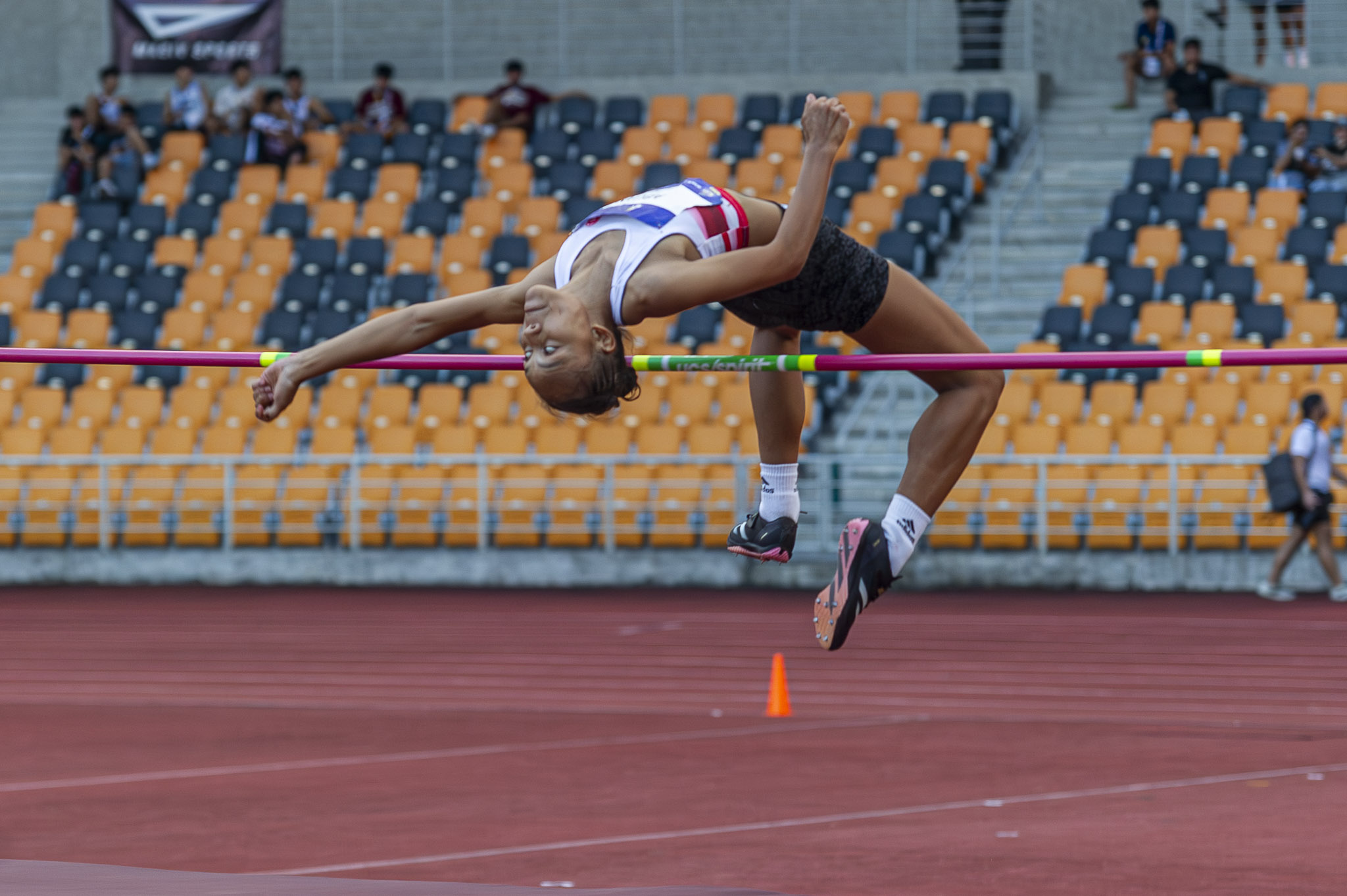 UAAP-S88-Athletics-High-Jump-womens-Mariel-Abuan-2 Azeneth Serat smashes 16-year UAAP record, powers UST to early lead in Women's Athletics ADMU AdU DLSU FEU News NU Track & Field UAAP UE UP UST - philippine sports news