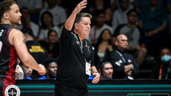 Tim Cone gestures to his players during Gilas' game versus Guam
