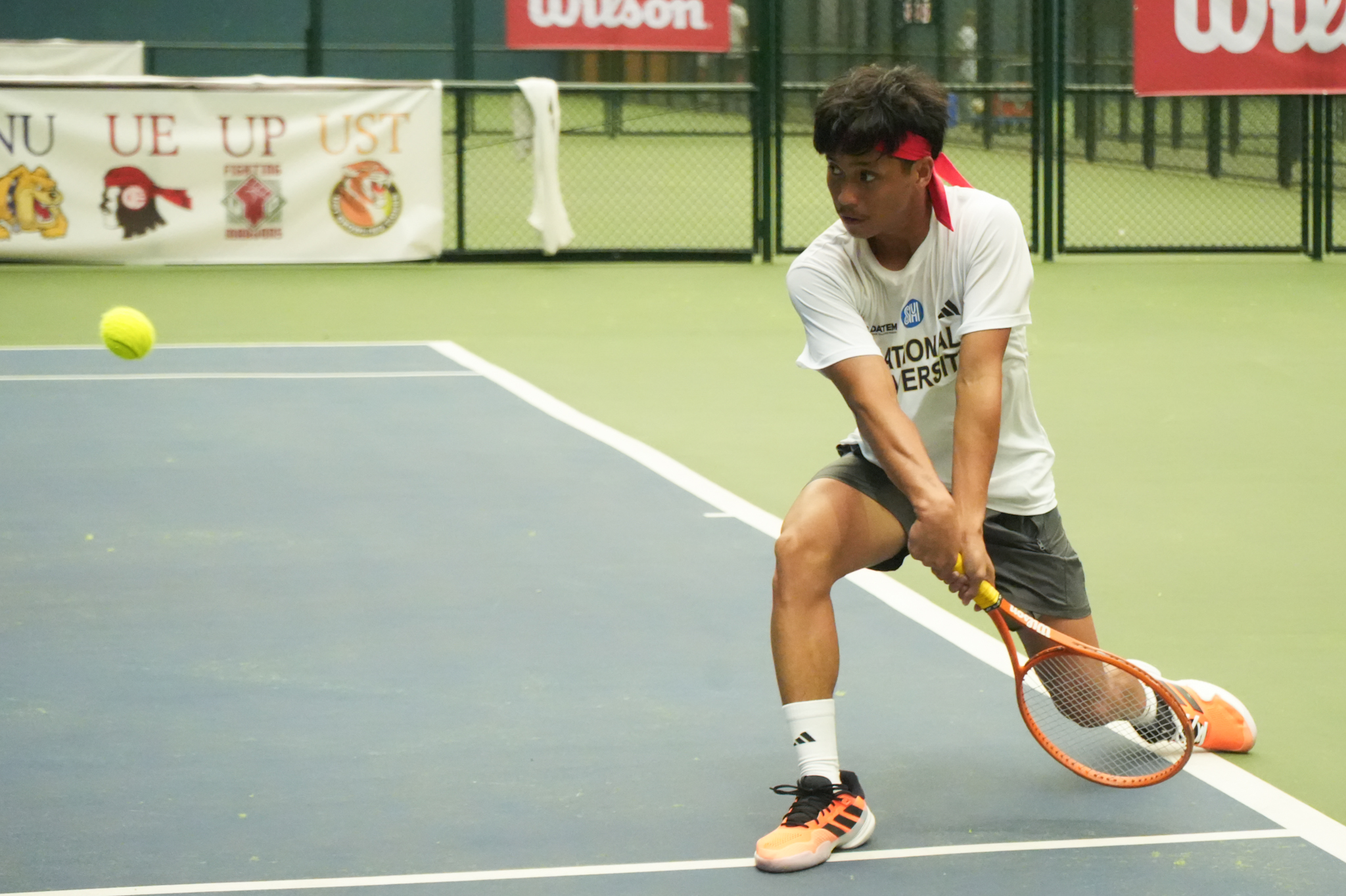 UAAP88_NU-vs-ADU_PADAO-Andre-2 UP climbs back to lead with win over UE in UAAP Men's Tennis ADMU AdU News NU Tennis UAAP UE UP UST - philippine sports news