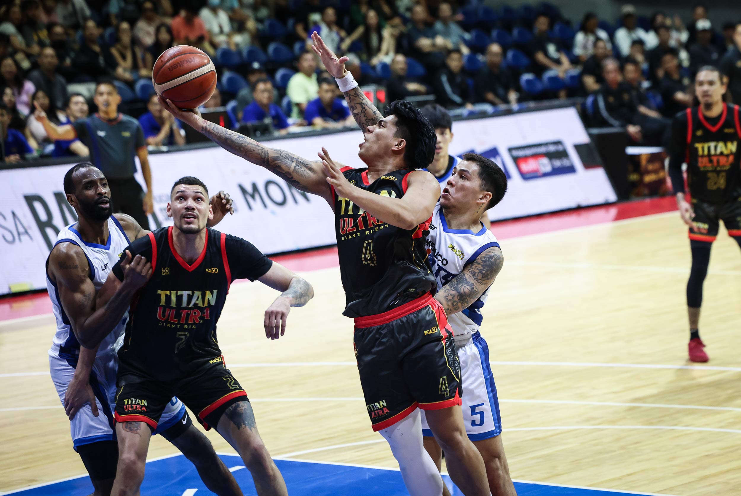 2026-PBA-Commissioners-Cup-Titan-Ultra-vs-Meralco-Bryan-Sajonia Meralco regains momentum, romps past Titan Ultra in PBA Comm's Cup Basketball News PBA - philippine sports news