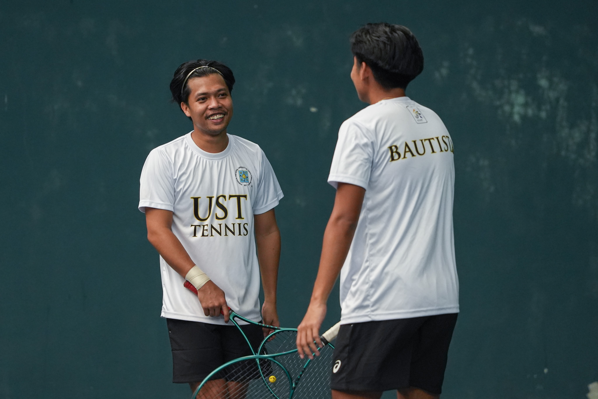 UAAP88-Tennis-Mens_-Ateneo-vs-UST_-SONSONA-Steven-00286 UP, UST inch closer to UAAP Men's Tennis semis berths with dominant wins ADMU AdU DLSU News Tennis UAAP UE UP UST - philippine sports news