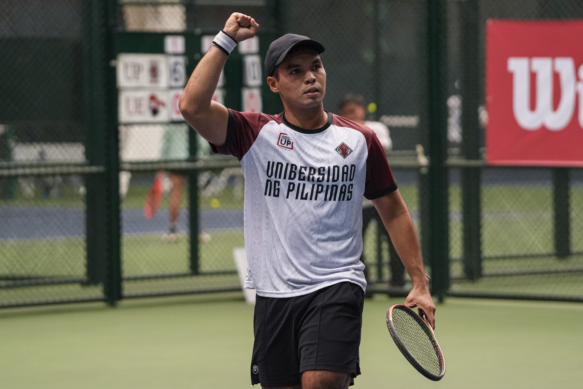 UAAP88-Tennis-Tournament-Final-Four_-UP-vs-UE_-IGLUPAS-Miguel-06079 UP returns to UAAP Men's Tennis Finals after 10 years, NU forces rubber vs UST News NU Tennis UAAP UE UP UST - philippine sports news