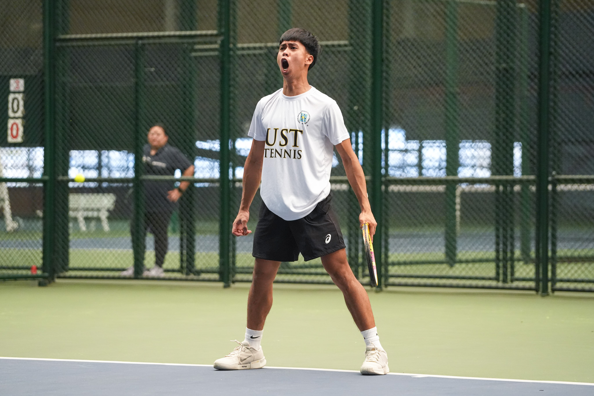UAAP88-Tennis-Tournament-Mens-Finals_-TANGUB-Ericjay-01606 UST secures 17th UAAP Men's Tennis title, ends UP's dream News Tennis UAAP Uncategorized UP UST - philippine sports news