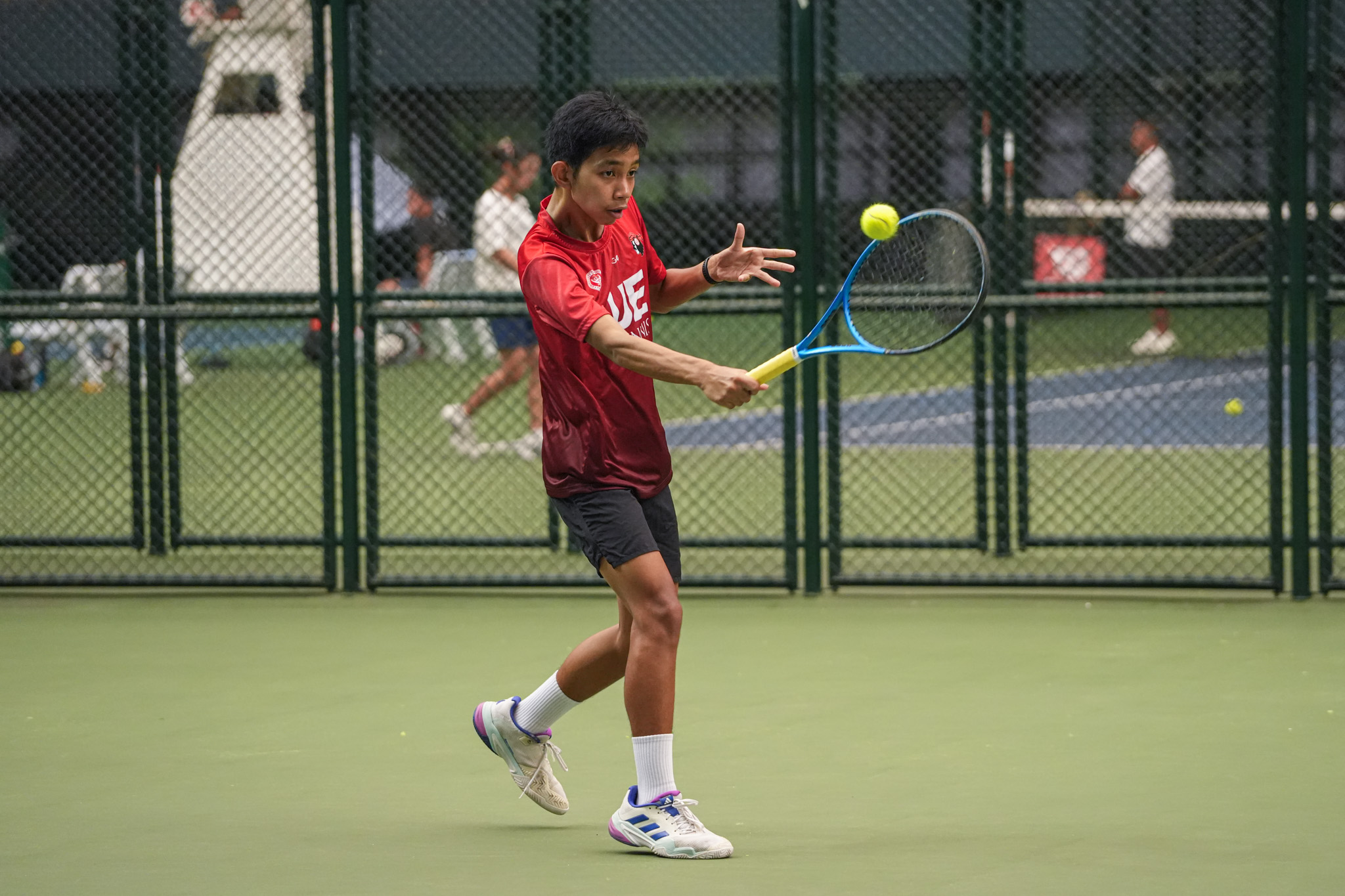 UAAP88-Tennis-Tournament-Semifinals_-DLSZ-vs-UE_-LICAYAN-Tristan-05969 UE, NUNS advance to UAAP Boys’ Tennis Finals ADMU DLSU News NU Tennis UAAP UE - philippine sports news