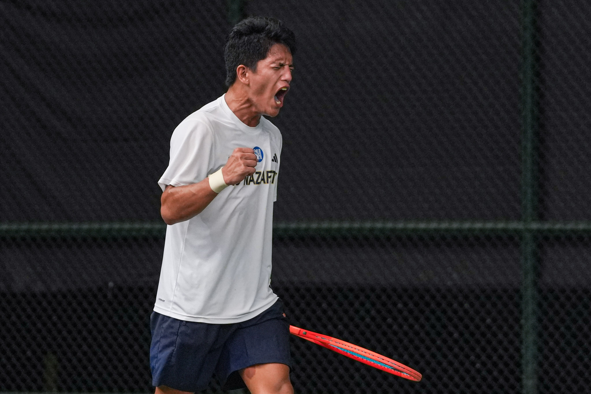 UAAP88-Tennis-Tournament-Semifinals_-NU-vs-Ateneo_-CABARAL-Ariel-06752 UE, NUNS advance to UAAP Boys’ Tennis Finals ADMU DLSU News NU Tennis UAAP UE - philippine sports news