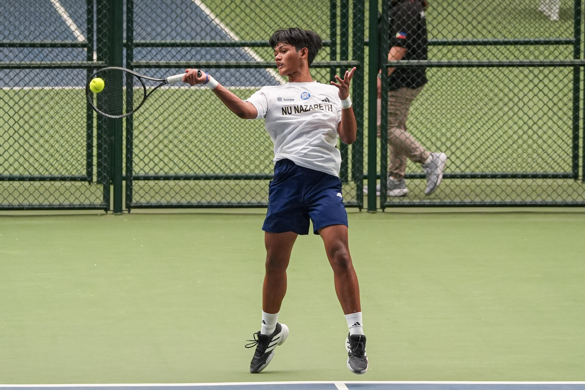UAAP88-Tennis-Tournament-Semifinals_-NU-vs-Ateneo_-LABASANO-Jeremiah-06643 UE, NUNS advance to UAAP Boys’ Tennis Finals ADMU DLSU News NU Tennis UAAP UE - philippine sports news
