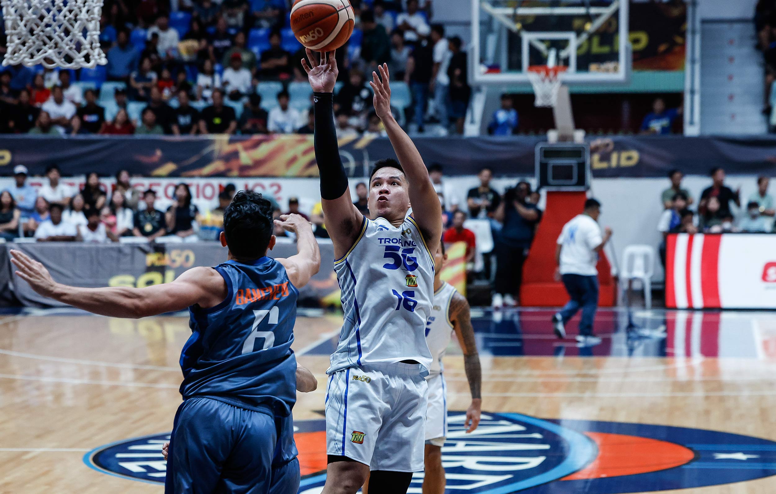 2026-PBA-Commissioners-Cup-SF1-Meralco-vs-TNT-Roger-Pogoy Heading sparks bench lift as TNT draws first blood vs Meralco in PBA semis opener Basketball News PBA - philippine sports news